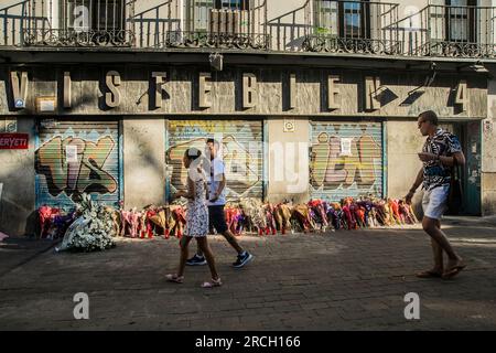 Madrid, Spain. 14th July, 2023. In memory of Concha, the owner of the clothing store located in the square who was murdered last week in a robbery at her business, and to denounce the abandonment of the neighborhood and the feeling of unsecured in the area. (Photo by Alberto Sibaja/Pacific Press) Credit: Pacific Press Media Production Corp./Alamy Live News Stock Photo