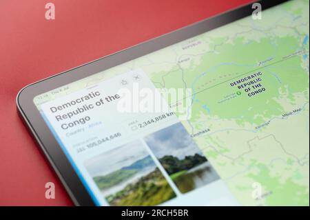New York, USA - July 6, 2023: Democratic republic congo on online apple maps in screen of ipad tablet close up view Stock Photo