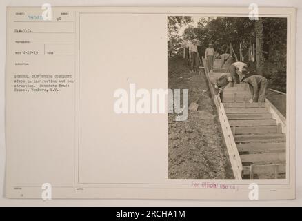 American military carpenters receiving instruction on building concrete steps at Saunders Trade School in Yonkers, New York during World War One. The photograph, dated April 27, 1919, shows members of the Student Army Training Corps (S.A.T.C) learning and practicing construction techniques. This image is for official use only. Stock Photo