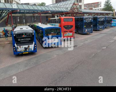 View through bus window of single-decker buses in town centre, Swindon ...