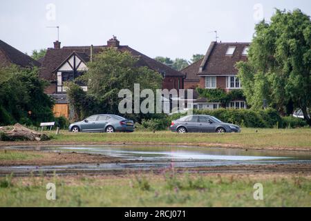 Dorney, Buckinghamshire, UK. 2nd July, 2023. Floodwater remains on Dorney Common much to the frustration of villagers living in Colenorton Crescent in nearby Eton Wick. Villagers report that they are getting a 'sewage stench' particularly in the evenings. Thames Water are allowed to discharge into Roundmoor Ditch next to the common, however, there Event Duration Monitoring shows that the last discharge into Roundmoor Ditch was in January. Some of the floodwater is now beginning to subside but it has been particularly bad in the past weeks despite there having been little rain. Credit: Maureen Stock Photo