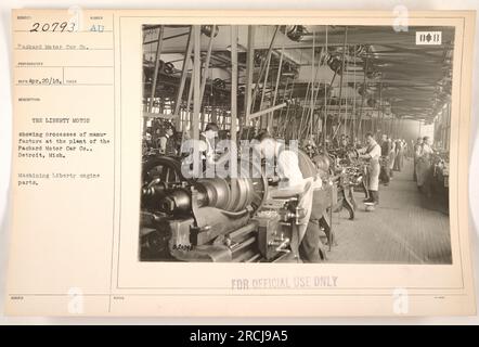 Manufacturing process of the Liberty motor at the Packard Motor Car Co., Detroit, Michigan. In this photo, workers are seen machining Liberty engine parts. The image is part of a collection of American military activities during World War One. (Caption is factual and not creative) Stock Photo