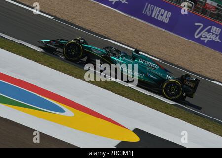 Aston Martin driver Lance Stroll of Canada, front, steers his car ...