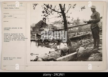 American engineers constructing a temporary wagon bridge in the town of Fleville, which had been destroyed by the retreating Germans. This image showcases the efforts of American troops to restore crucial infrastructure in the Argonne region during World War One. Stock Photo