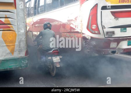 Dhaka, Bangladesh - July 15, 2023: Expired vehicles in Dhaka emit so much black smoke that it is one of the reasons for air pollution. Stock Photo