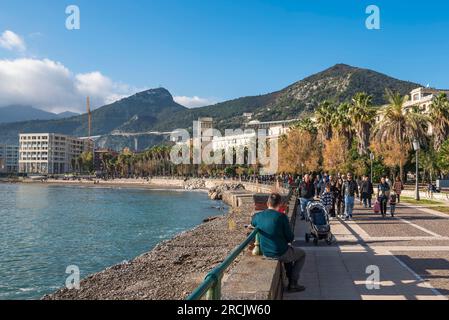 Salerno, Italy - 25th Dec 2022: Tourists and locals strolling along Lungomare Trieste Stock Photo