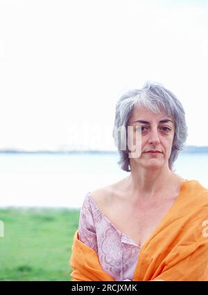 Portrait of mature woman in nature. Stock Photo