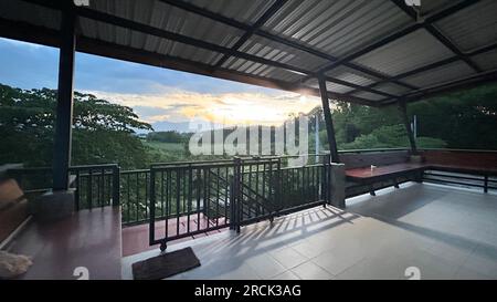 Beautiful view of the balcony at sunrise from the terrace. Stock Photo