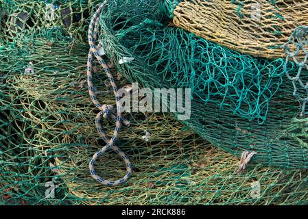 Green and yellow fishing net Stock Photo