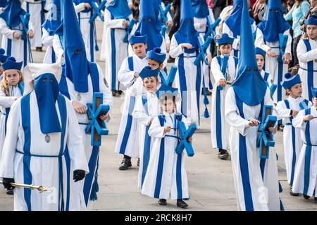 Children in a Semana Santa procession in Zaragoza, Spain Stock Photo