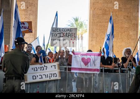 Tel Aviv, Israel. 11th July, 2023. Protestors wave the Israeli flag and hold signs during a demonstration against the judicial overhaul in Ben Gurion Airport. Tel Aviv, Israel. July 11th 2023. (Photo by Matan Golan/Sipa USA). Credit: Sipa USA/Alamy Live News Stock Photo