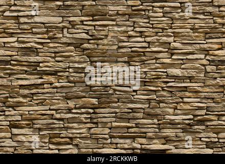 Beige and yellow masonry wall texture, seamlessly tileable Stock Photo
