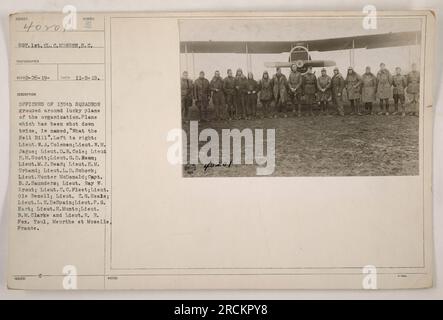 LT. COL. GEO. LUBEROFF, Chief Q.M. of the 1st Army, is pictured with some  of his assistants. In the front row, from left to right, are Lt. Cel.  Jeremiah Beall, Ord., Chief