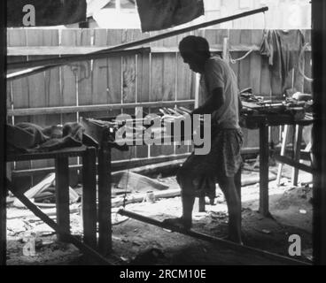 Photographs taken in Malaysia, Malacca,Muar, Batu Pahat, Rompin, Mersing, Kota Bharu, Endau, Singapore during 1973. Streetlfe, markets, rubber collecting and villages. Stock Photo