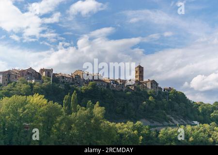 view of beautiful old town of Ainsa with forest in the Spanish Pyrenees on a autumn day, Huesca, Spain Stock Photo