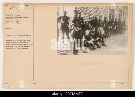 American aviators and aviation students in Italy gathered outside their barracks at a training field. This photo was taken in September 24, 1918, and is an Italian official photo. It is labeled as 'FOR OFFICIAL USE ONLY.' Stock Photo