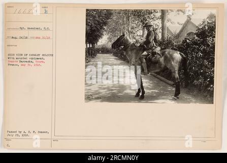 A cavalry soldier with mounted equipment at Rennes Barracks in Tours, France on May 30, 1918. The photograph was taken by Sgt. Moscioni, S.C., with the description number E, and was issued and passed by A.E.P. Censor on July 29, 1918. Stock Photo