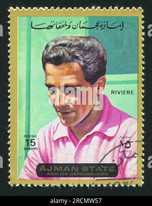 AJMAN - CIRCA 1976: stamp printed by Ajman, shows Roger Riviere, circa 1976 Stock Photo