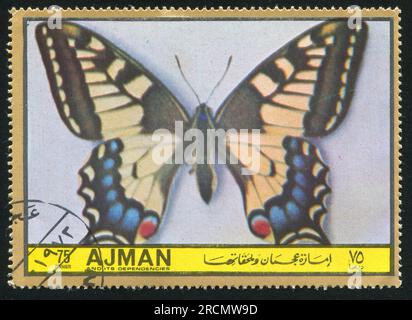 AJMAN - CIRCA 1971: stamp printed by Ajman, shows butterfly, circa 1971 Stock Photo