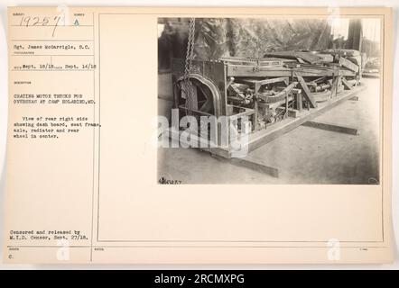 Sgt. James McGarrigle is shown crating motor trucks at Camp Holabird, Maryland during World War One. The photograph provides a view of the rear right side, including the dash board, seat frame, axle, radiator, and rear wheel in the center. It was censored and released by M.I.D. Censor on September 27, 1918. Stock Photo