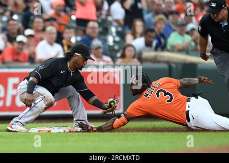 Baltimore Orioles' Jorge Mateo slides safely into home to score and tie the  game on a double by Anthony Santander against Detroit Tigers in the eighth  inning of a baseball game, Sunday