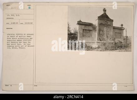 A memorial erected by the Germans in honor of a deceased soldier. The dates '1914-191-' are engraved, with uncertainty about the war's duration. Located on a road north of Brieul-les, Meuse, France. Taken by Lt. S.C. Fox from Co 2-26-19 on November 21, 1918. (Photograph Notes: 40079) Stock Photo