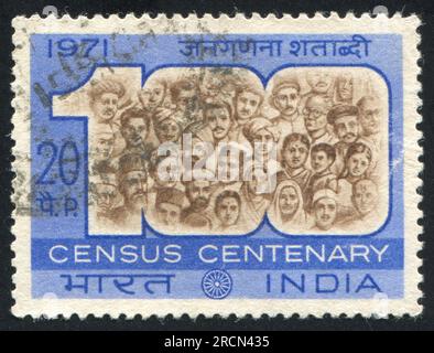 INDIA - CIRCA 1971: stamp printed by India, shows faces of men, circa 1971 Stock Photo
