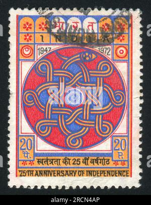 INDIA - CIRCA 1973: stamp printed by India, shows Wheel of Asoka, Naga, (Serpent), circa 1973 Stock Photo
