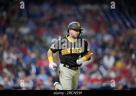 San Diego Padres' Matthew Batten, right, is tagged out by Philadelphia  Phillies second baseman Edmundo Sosa after trying to steal second during  the fifth inning of the first baseball game in a