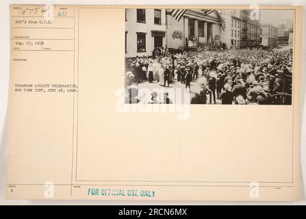 Soldiers and civilians gather in New York City on June 16, 1918, to celebrate Ukrainian loyalty. The event is an official gathering, observed and documented by a photographer from the C.P.I. This image is part of a collection of American military activities during World War I, labeled as Subject 15784. Stock Photo