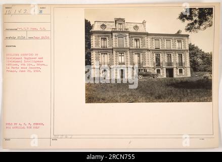 Image: The photograph shows a building occupied by the Divisional Engineer and Divisional Intelligence officer of the 4th Division Headquarters in La Forte sous Jouarre, France on June 29, 1918. The photo was taken by Pvt.C.E.Dunn and is part of the collection 'Photographs of American Military Activities during World War One.' The image is numbered 15142 and was received on July 27, 1918. It is marked as 'FOR OFFICIAL USE ONLY' by the A.E.F. Censor. Stock Photo