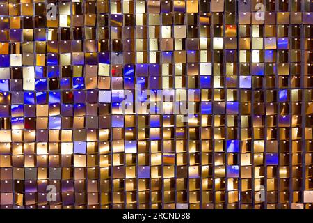 natural texture gold mirror with blue refection, made of hundreds of squares Stock Photo