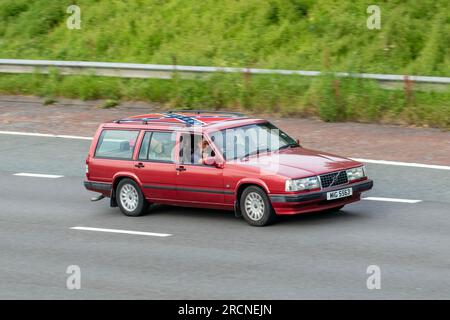 1997 90s nineties custom 'General Jackson' Volvo 940 Celebration LPT 135 Red Car Estate Petrol 2316 cc travelling at speed on the M6 motorway in Greater Manchester, UK Stock Photo