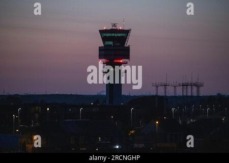 Steenokkerzeel, Belgium. 15th July, 2023. Illustration picture shows the control tower at Brussels Airport by night, in Zaventem, Saturday 15 July 2023. Federal Minister of Mobility Gilkinet (Ecolo) presented a draft ministerial decree to limit noise nuisance for residents living near the internatinoal airport, this week. A striking measure is a total ban on night flights from 11 p.m. and 6 a.m. BELGA PHOTO NICOLAS MAETERLINCK Credit: Belga News Agency/Alamy Live News Stock Photo