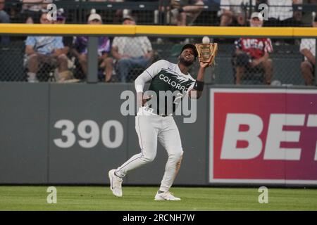 Colorado Rockies left fielder Jurickson Profar (29) wears a pair of Nike  cleats featuring the face of the team's mascot, Dinger the dinosaur, in the  ninth inning of a baseball game Tuesday