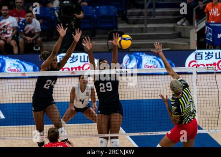 Arlington, USA. 15th July, 2023. Ogbogu Chiaka (L) and Lanier Khalia (C) block during the semifinal match between T¨¹rkiye and the United States at the Women's Volleyball Nations League in Arlington, the United States, July 15, 2023. Credit: Chen Chen/Xinhua/Alamy Live News Stock Photo