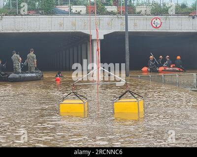 South Korea. 16th July, 2023. (230716) -- SEOUL, July 16, 2023 (Xinhua) -- Rescuers are in operation at a submerged garage in Chongju City, North Chungchong Province, South Korea, on July 16, 2023. The Death toll from the torrential rains over the past week in South Korea rose to 33, while 10 others were missing, relevant authorities said on Sunday.According to the central disaster and safety countermeasure headquarters, 33 people had been found dead in southeastern North Gyeongsang province and central Chungcheong province. (NEWSIS via Xinhua) Credit: Xinhua/Alamy Live News Stock Photo