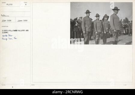 Lieutenant Colonel James M. Love of the 80th Division at Camps Lee, Virginia received a paraphernalia symbol from a member of the American military. This photograph was taken in 1918 as part of the documentation of military activities during World War One. Stock Photo