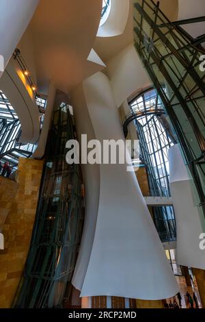 The Guggenheim Museum Bilbao designed by architect Frank Gehry, and located in city of Bilbao, Basque Country, Spain. The atrium, which Gehry also use Stock Photo