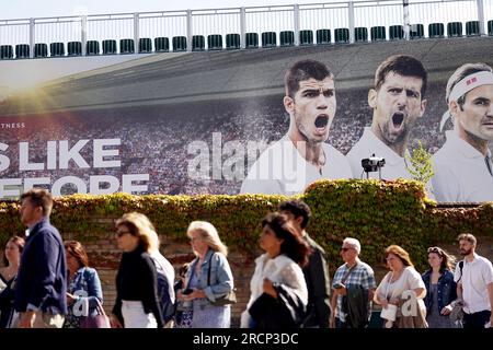 People queuing on day fourteen of the 2023 Wimbledon Championships at