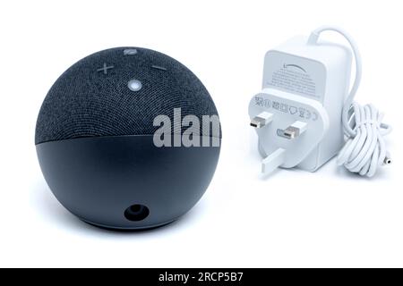 Amazon Alexa Dot Charcoal 5th Generation and Power Plug Stock Photo