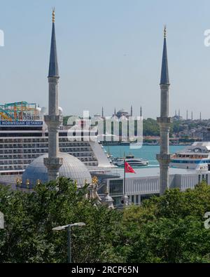 Nusretiye Mosque and a Cruise ship at Galataport in Istanbul together with Istanbul Modern, a Museum of Modern Art. Turkey. Hagia Sophia in background. Stock Photo