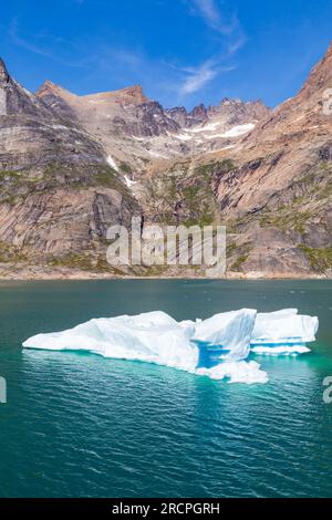 Stunning scenery with iceberg going through Prince Christian Sound, Prins Cristian Sund, at South Greenland in July Stock Photo