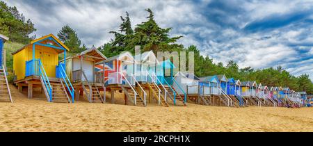 Beach Huts on stilts on Wells Beach Next-the-sea North Norfolk England UK Stock Photo
