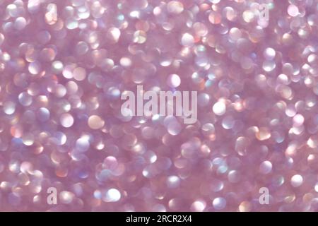 Abstract lights purple, violet and white light bokeh background for Xmas, Valentine, New Year, Easter or special event and moment. Violet blurred ligh Stock Photo