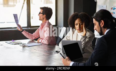 Multiethnic corporate team olleagues working in modern office Stock Photo