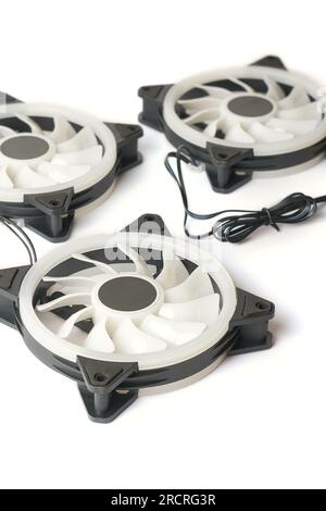 cooling fans with white plastic blades, cooling computers and other electronic equipments, isolated on white background, taken in selective focus Stock Photo