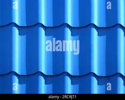 Brand new blue roofing from stainless metal plates Stock Photo