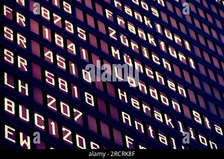Close up of departures board in airport Stock Photo