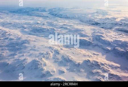 Greenlandic ice cap with frozen mountains and fjords aerial view, near Nuuk, Greenland Stock Photo